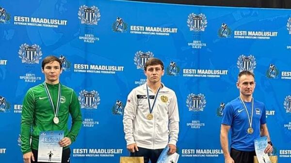 Победители на пьедестале почета чемпионата по борьбе имени Кристиана Палусалу в Талине - Sputnik Армения