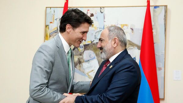 Премьер-министр Никол Пашинян встретился с премьером Канады Джастином Трюдо на 18-м саммите Международной организации Франкофонии (19 ноября 2022). Джерба - Sputnik Армения