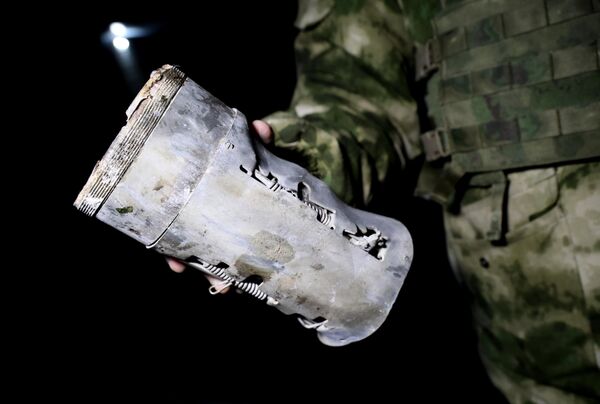 Фрагмент снаряда РСЗО, найденный после обстрела ВСУ Калининского района  - Sputnik Армения
