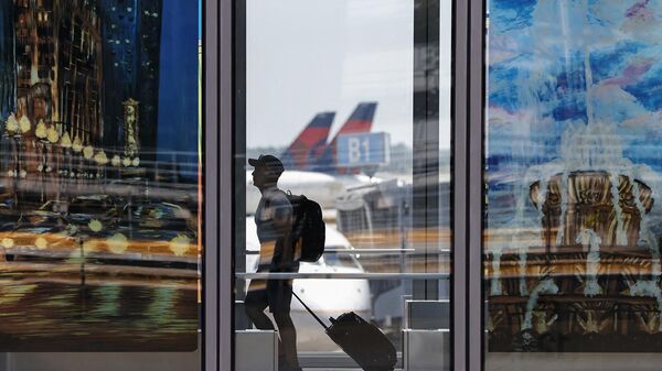 Пассажир в международном аэропорту О'Хара в Чикаго - Sputnik Армения