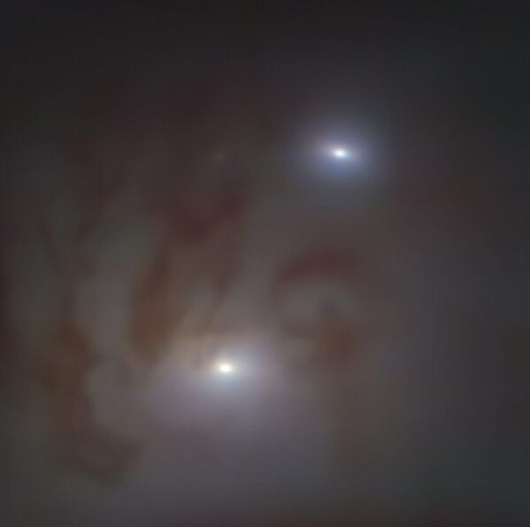 NGC 7727 գալակտիկան գտնվում է Երկրից 89 միլիոն լուսային տարի հեռավորության վրա՝ Ջրհոսի համաստեղությունում։Սա մինչ օրս հայտնաբերված գերզանգվածային սև խոռոչների ամենամոտ զույգն է: - Sputnik Արմենիա