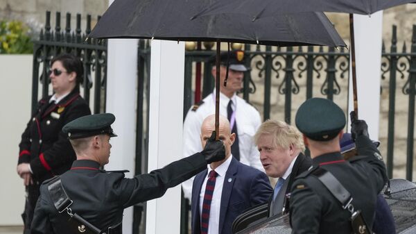 Бывший премьер-министр Великобритании Борис Джонсон прибывает в Вестминстерское аббатство - Sputnik Армения