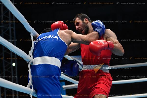 Боксер Гурген Мадоян в мужской весовой категории 71 кг. во время боя с противником из Сербии на III Европейских Летних Играх (28 июня 2023). Краков - Sputnik Армения