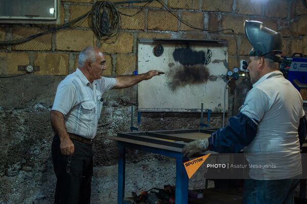 Сотрудники компании QaylTech во время работы - Sputnik Армения