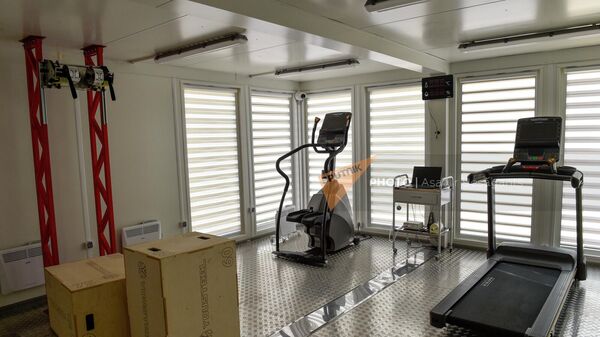 Армянские спасатели сдают экзамены после курса повышения квалификации на учебно-тренировочном тренажере для спасателей и пожарников в Российско-Армянском центре гуманитарного сотрудничества (28 июля 2023). Котайк - Sputnik Армения