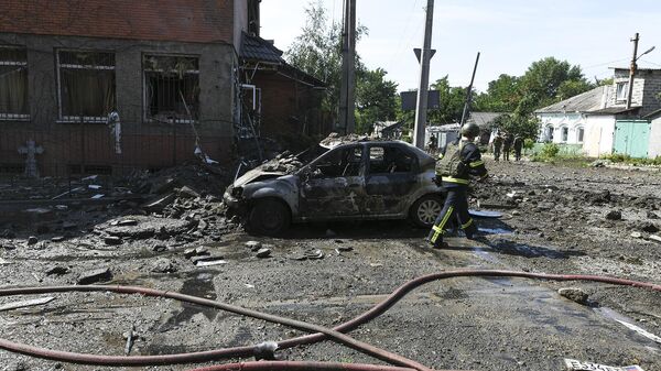 Автомобиль, сгоревший в результате обстрела Донецка со стороны ВСУ  - Sputnik Армения