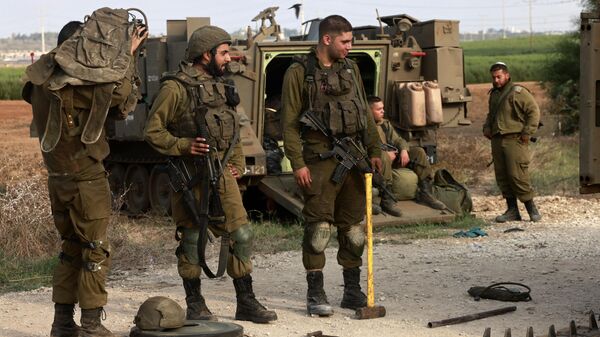 Израильские войска собираются на границе с сектором Газа (8 октября 2023). Израиль  - Sputnik Армения