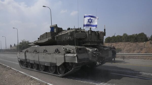 Израильский танк направляется на юг недалеко от Сдерота (8 октября 2023). Израиль - Sputnik Армения