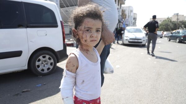 Իսրայելական ռմբակոծությունից տուժած երեխան - Sputnik Արմենիա