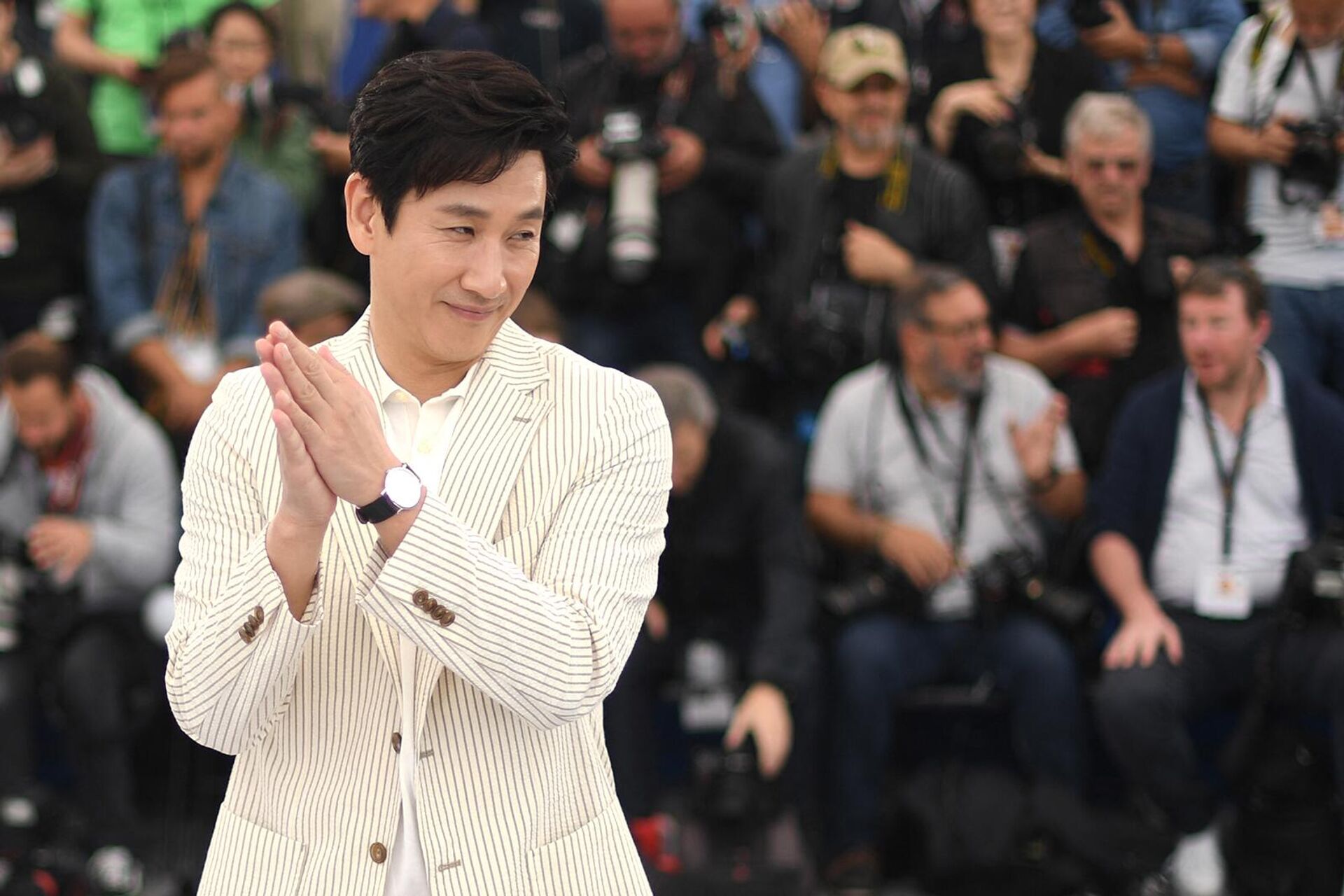 Южнокорейский актер Ли Сон Гюн во время фотосессии фильма Паразит на 72-м Каннском кинофестивале (22 мая 2019). Канны - Sputnik Արմենիա, 1920, 27.12.2023
