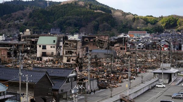 Последствия сильного землетрясения в городе Вадзима (5 января 2024). Япония - Sputnik Армения
