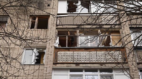 На Харьковской горе в результате атаки ВСУ беспилотником поврежден жилой многоквартирный дом (13 марта 2024). Белгород - Sputnik Армения
