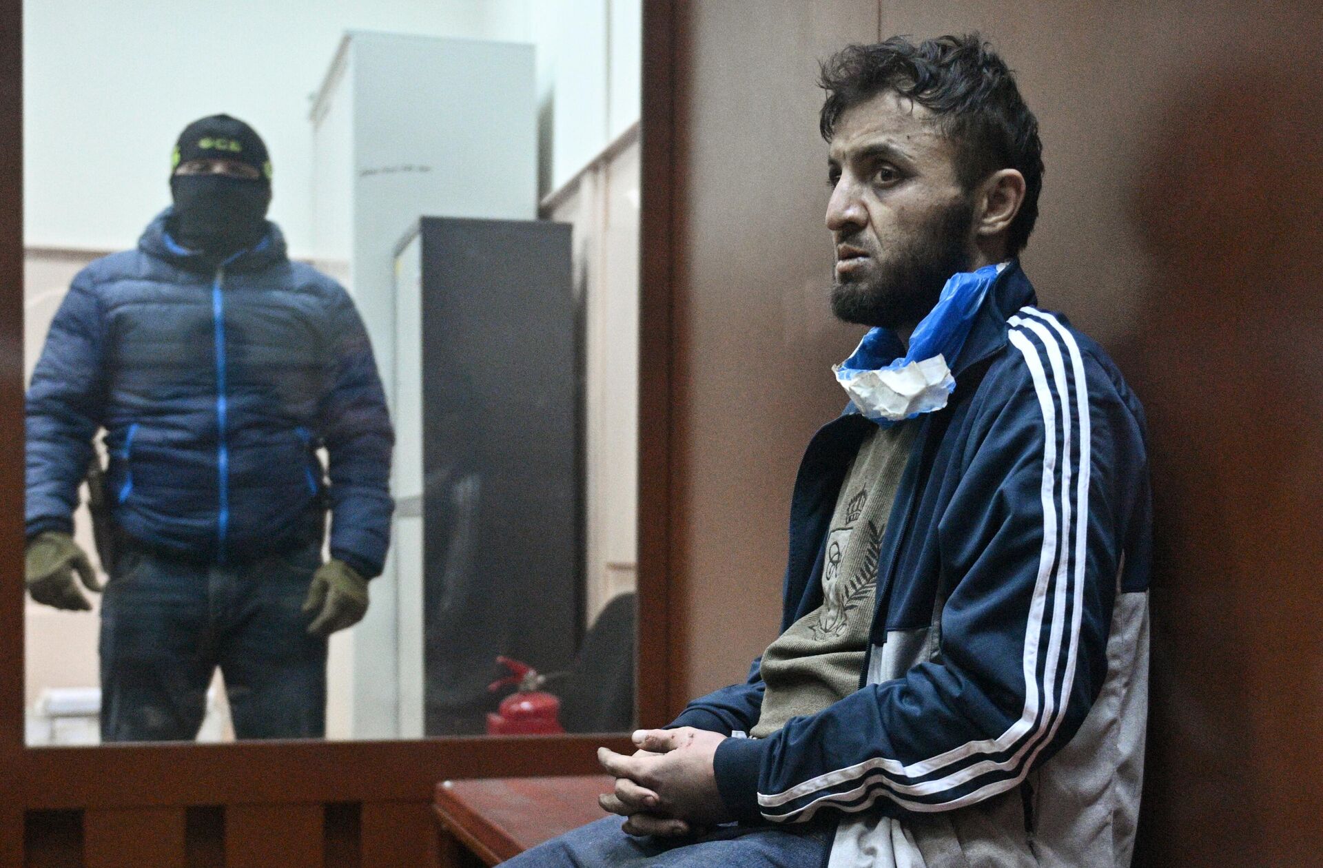 Далержон Мирзоев, задержанный по подозрению в террористическом акте в Крокус Сити Холл, в здании Басманного суда (24 марта 2024). Москва - Sputnik Армения, 1920, 25.03.2024