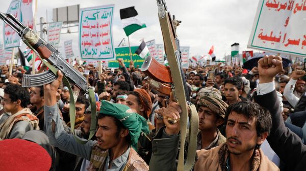 Сторонники Хуситов принимают участие в митинге в секторе Газа, в Сане (8 марта 2024). Йемен - Sputnik Армения