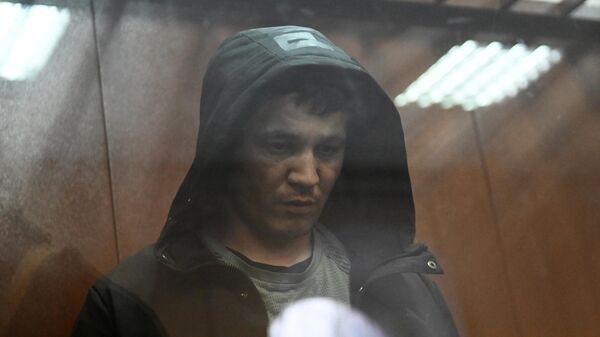 Фигурант уголовного дела о террористическом акте в Крокус Сити Холле Якубджон Юсуфзода во время избрания меры пресечения в Басманном суде (1 апреля 2024). Москва - Sputnik Армения