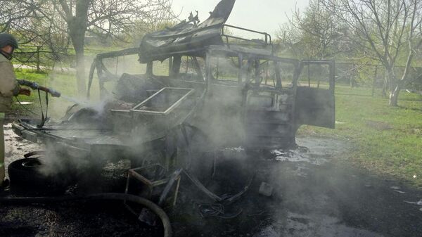 В результате обстрела со стороны украинских ВС в поселке Теткино сгорел автомобиль газовой службы (10 апреля 2024). Курская область - Sputnik Армения