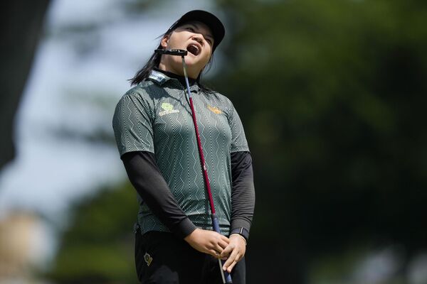 Вичани Мичай из Таиланда отреагировала на пропущенный удар во время Открытого чемпионата США по гольфу, США. - Sputnik Армения