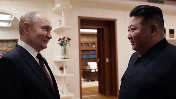 Владимир Путин и Ким Чен Ын на встрече (18 июня 2024). Пхеньян - Sputnik Армения