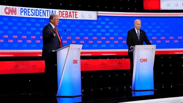 Действующий и бывший президенты США, кандидаты в президенты Джо Байден и Дональд Трамп принимают участие в первых президентских дебатах на выборы 2024 года в студии CNN (27 июня 2024). Атланта - Sputnik Армения