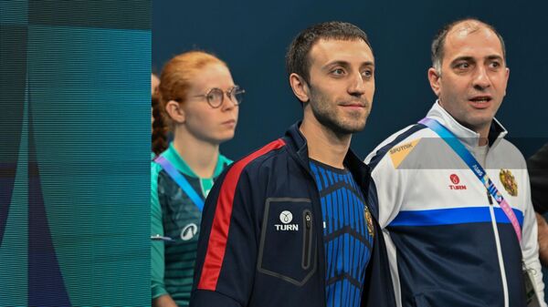 Гимнаст Артур Давтян перед выступлением на летних Олимпийских играх 2024 года (27 июля 2024). Париж - Sputnik Армения