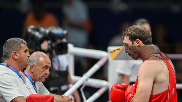 Армянский боксер Давид Чалоян в весовой категории 92 кг в бою против Делишиуса Ори на летних Олимпийских играх 2024 года (29 июля 2024). Париж - Sputnik Армения