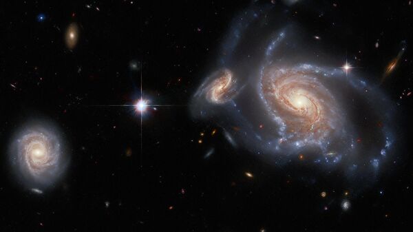 Множество спиральных галактик: NGC 1356, LEDA 467699, LEDA 95415 и IC 1947 - Sputnik Армения
