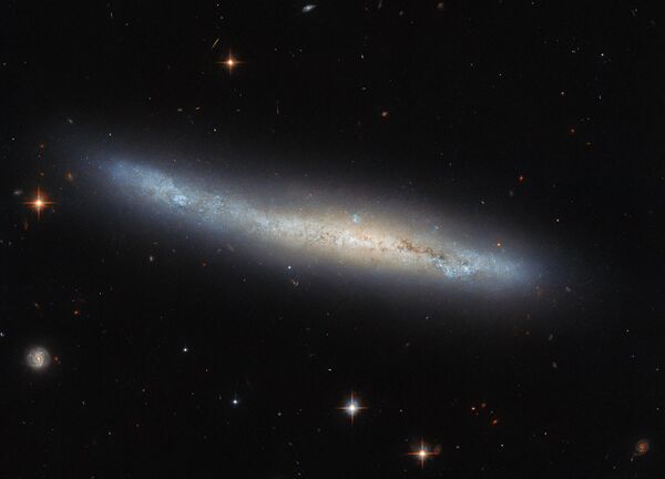 Галактика NGC 4423, которая находится в 55 млн световых лет от Земли в созвездии Девы - Sputnik Армения