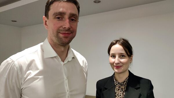 Представители российской ИТ-копмании Осмокод Алексей Онищук и Юлия Эльшина - Sputnik Армения