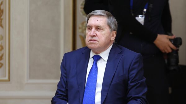 Помощник президента РФ Юрий Ушаков принимает участие в заседании Высшего Евразийского экономического совета (27 июня 2025). Минск - Sputnik Армения