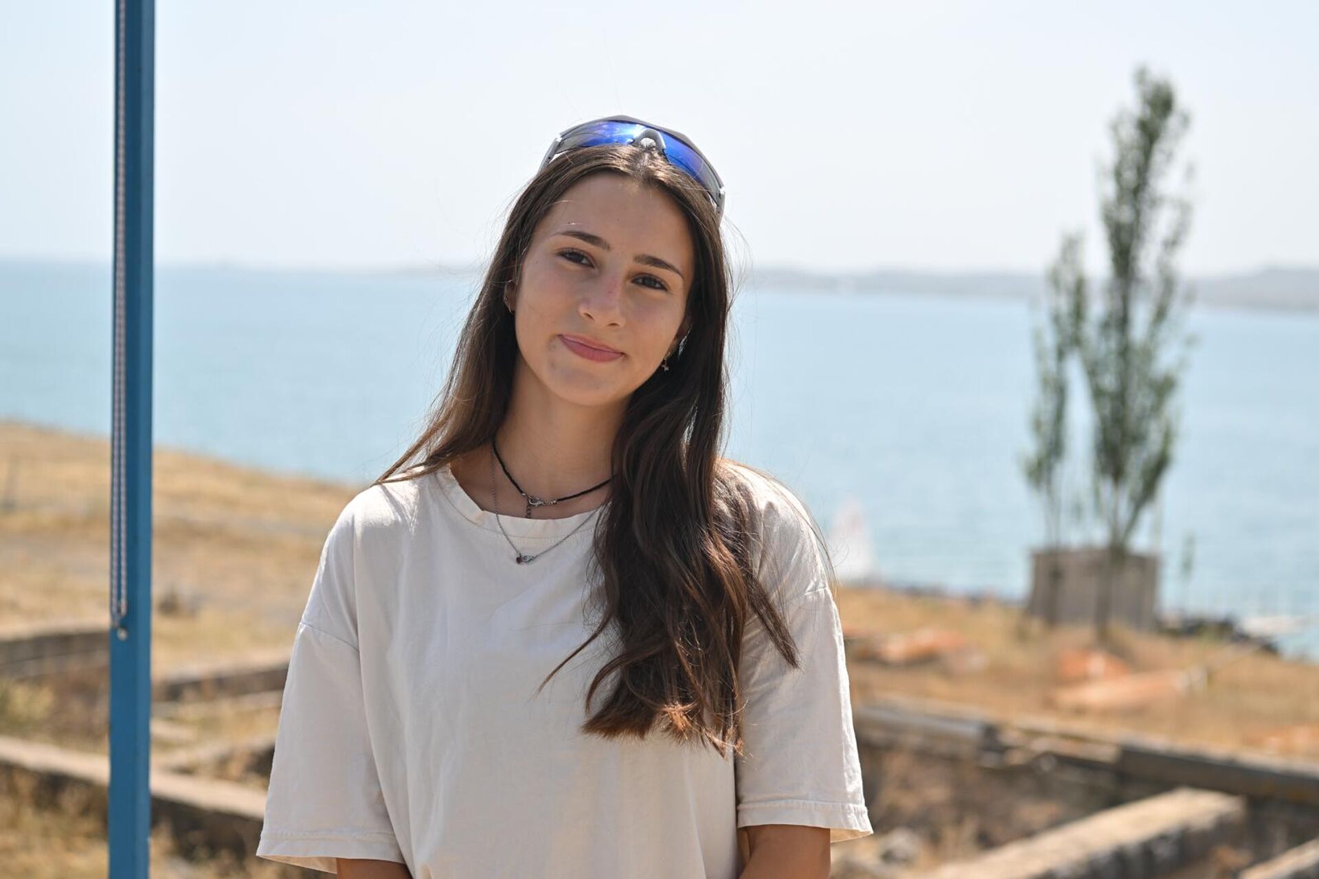 Участница из Грузии Анастасия Татаришвили на международном мемориальном турнире по парусному спорту имени адмирала Исакова на озере Севан - Sputnik Армения, 1920, 05.08.2025