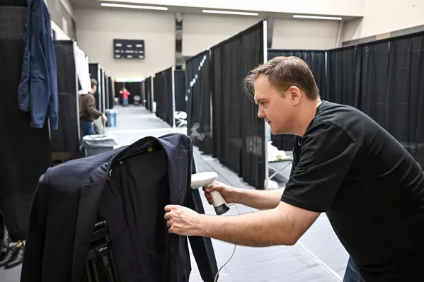 Журналист кремлевского пула на спортивной арене Airlines Center Журналист кремлевского пула на спортивной арене Airlines Center - Sputnik Армения