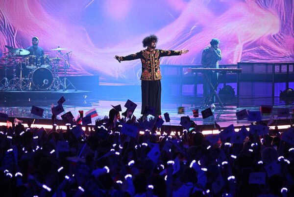 Раухан Малик (Индия)Певец, композитор и продюсер из Кашмира, чьё творчество соединяет народные мотивы с элементами рока и поп-музыки. Его песни — это история Кашмира, рассказанная на современном музыкальном языке и находящая отклик у слушателей в Индии и за её пределами. - Sputnik Армения