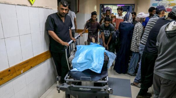 Пострадавшие в результате израильских ударов в Рафах палестинцы в больнице Насер в Хан-Юнисе (24 сентября 2025). Газа - Sputnik Армения