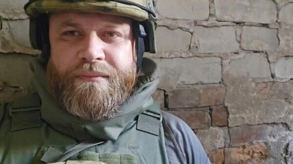 Военный корреспондент РИА Новости Иван Зуев - Sputnik Արմենիա