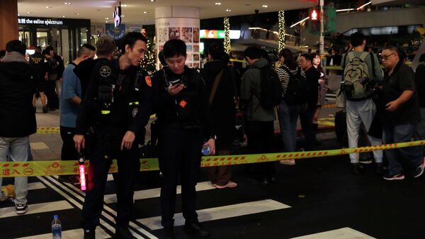 Тайваньская полиция оцепила место происшествия после нападения с ножом в Тайбэе (19 декабря 2025). Тайвань - Sputnik Армения