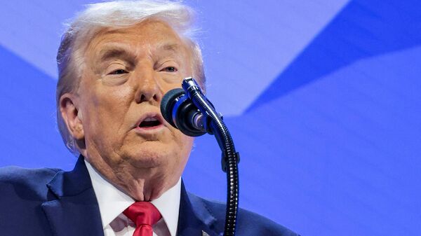 Президент США Дональд Трамп выступает на 56-м ежегодном Всемирном экономическом форуме (21 января 2026). Давос - Sputnik Армения