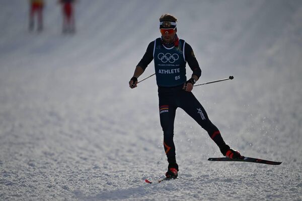 Микаэл Микаэлян на Зимней Олимпиаде (8 февраля 2026). Италия - Sputnik Армения