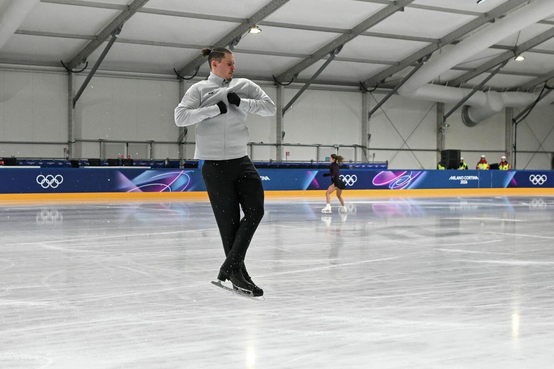 Фигуристы из Армении Карина Акопова и Никита Рахманин во время тренировки (14 февраля 2026). Милан - Sputnik Արմենիա, 1920, 15.02.2026