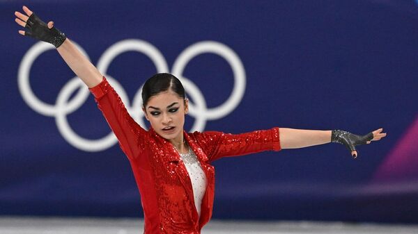 Аделия Петросян выступает в короткой программе года на ледовой арене Milano Cortina на зимних Олимпийских играх 2026 - Sputnik Армения