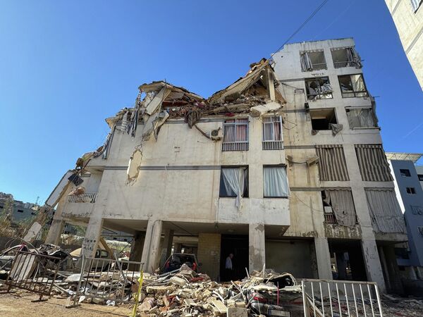 Разрушения жилых зданий в южных пригородах Бейрута после израильских атак - Sputnik Армения
