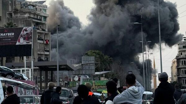 Израильские ВВС ударили по жилому дому в центре Бейрута (12 марта 2026). Ливан - Sputnik Армения