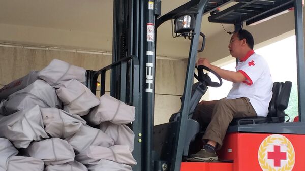 Работник Китайского Красного Креста - Sputnik Армения