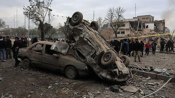 Последствия нападения на площадь мучеников в Тегеране (16 марта 2026). Иран - Sputnik Армения