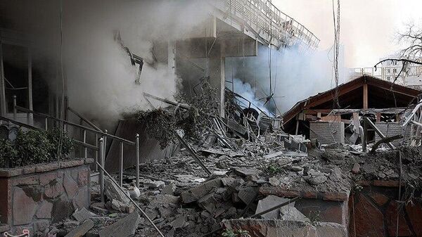 Последствия нападения на площадь мучеников в Тегеране (16 марта 2026). Иран - Sputnik Армения