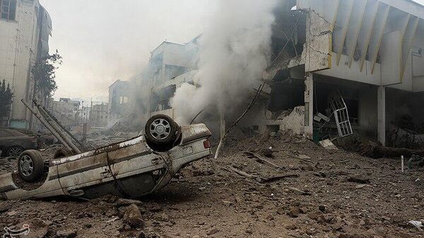 Последствия нападения на площадь мучеников в Тегеране (16 марта 2026). Иран - Sputnik Армения