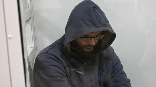 Пасынок рок-музыканта Стаса Намина Роман Ткаченко, обвиняемый в убийстве сводного брата и родной бабушки, на заседании Московского областного суда - Sputnik Армения