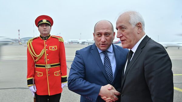 Президент Ваагн Хачатурян прибыл в Грузию для участия в похоронах Католикоса-Патриарха всея Грузии Ильи Второго (22 марта 2026). Тбилиси - Sputnik Արմենիա
