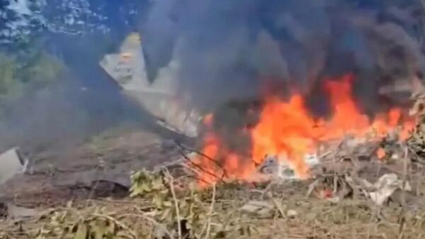 Пожар на месте разбившегося самолета (23 марта 2026). Колумбия - Sputnik Армения