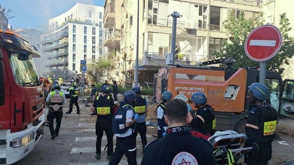 Разрушения в Тель-Авиве после попадания иранских ракет (24 марта 2026). Израиль - Sputnik Армения