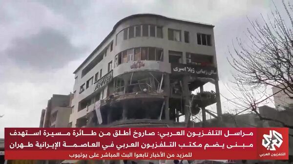 Здание катарского телеканала Al Araby TV в Тегеране получило повреждения в результате удара США - Sputnik Армения